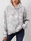 Woman wearing a grey Camouflage Oversized Hoodie