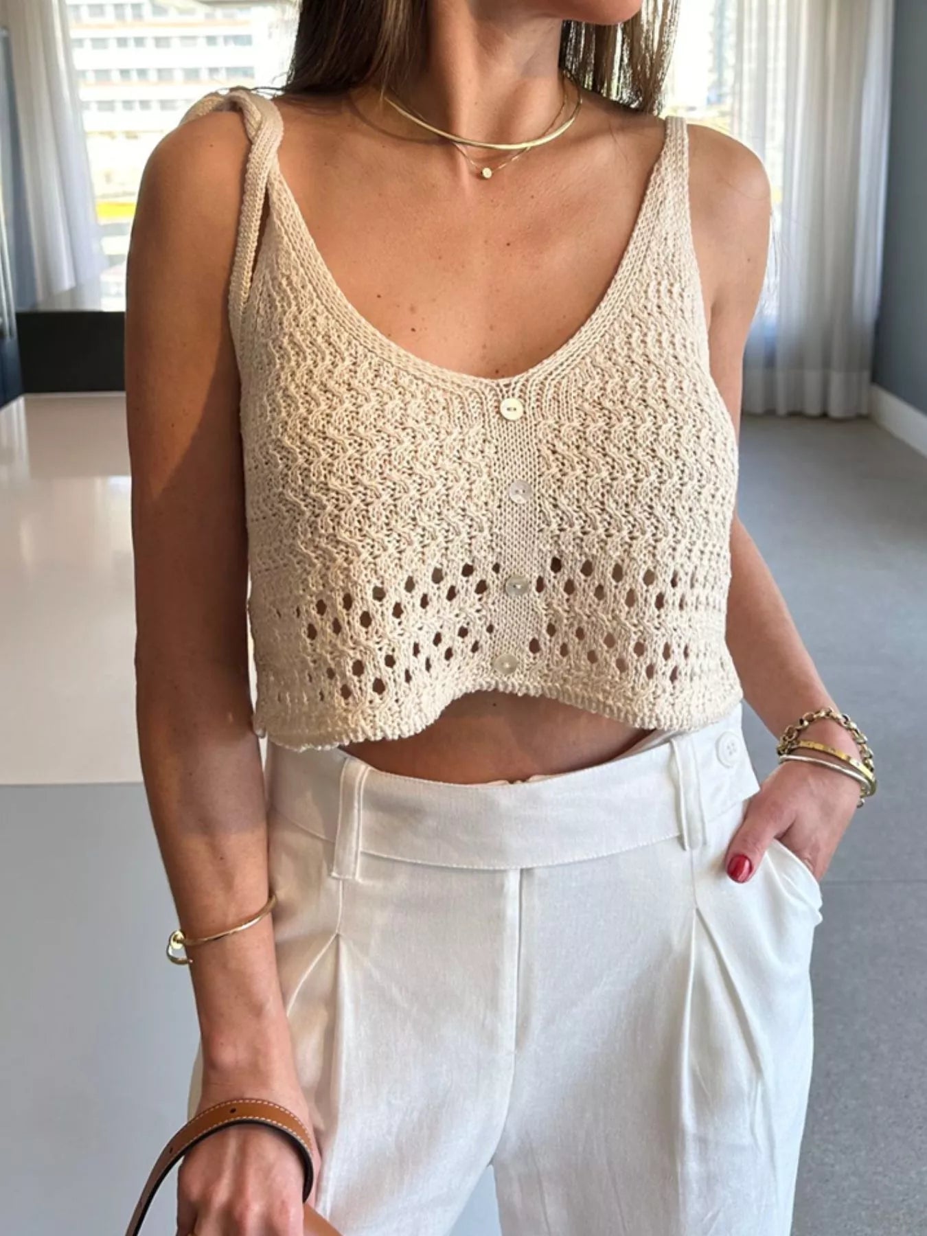 Woman Wearing A Crochet Knit Button-Front Cami