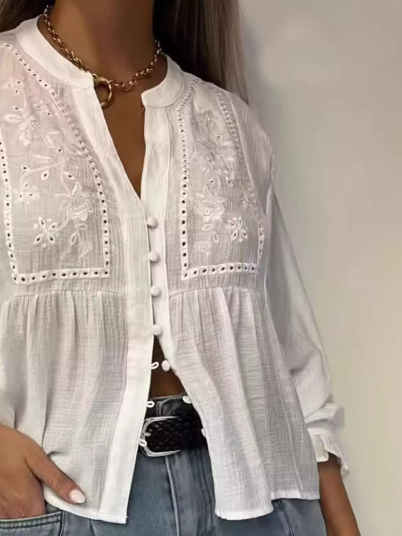 Woman wearing a embroidered Detail Button-Down Blouse