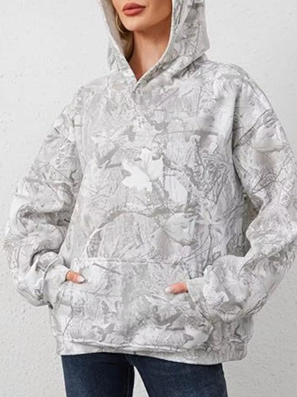 Woman wearing a grey Camouflage Oversized Hoodie