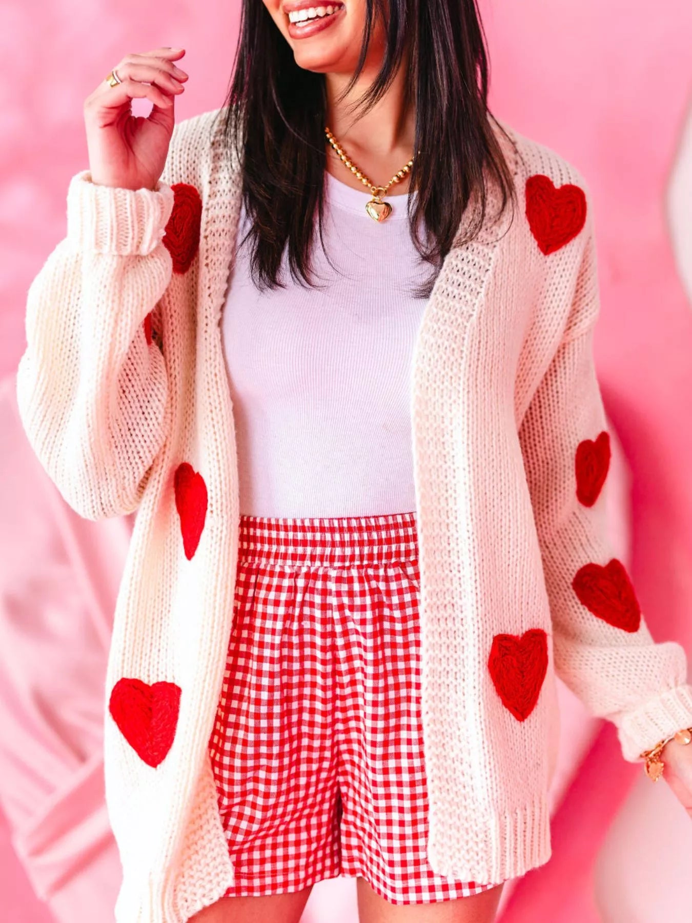 Woman Wearing A Heart Open Front Dropped Shoulder Cardigan
