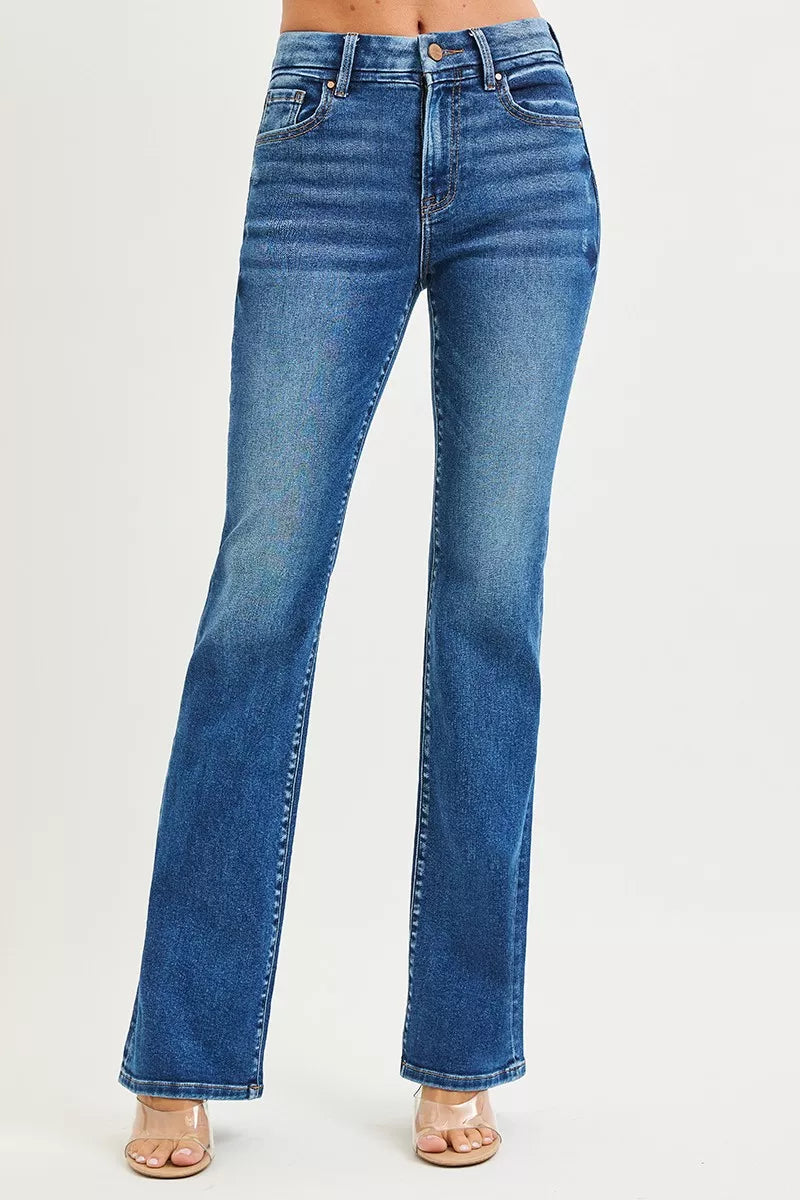 Woman Wearing High-Rise Distressed Bootcut Jeans