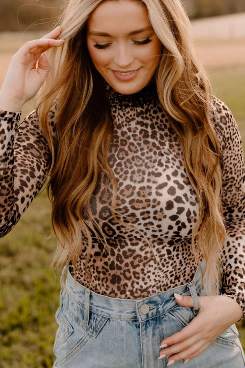 woman wearing a Turtleneck Leopard Long Sleeve Bodysuit