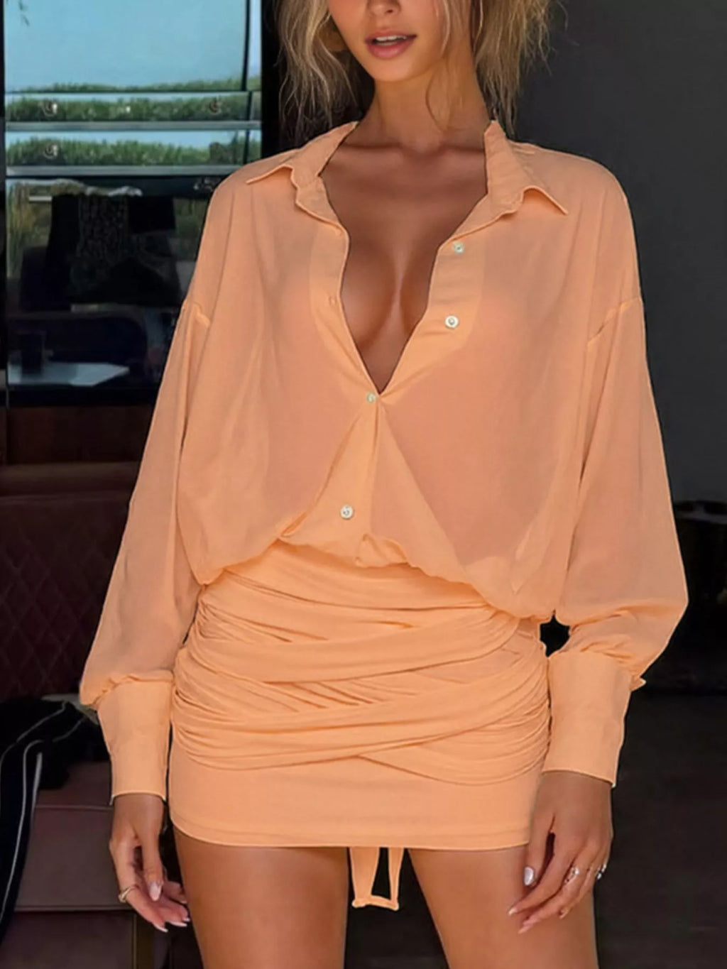 Woman Wearing A Tie Back Sheer Button-Down Mini Dress