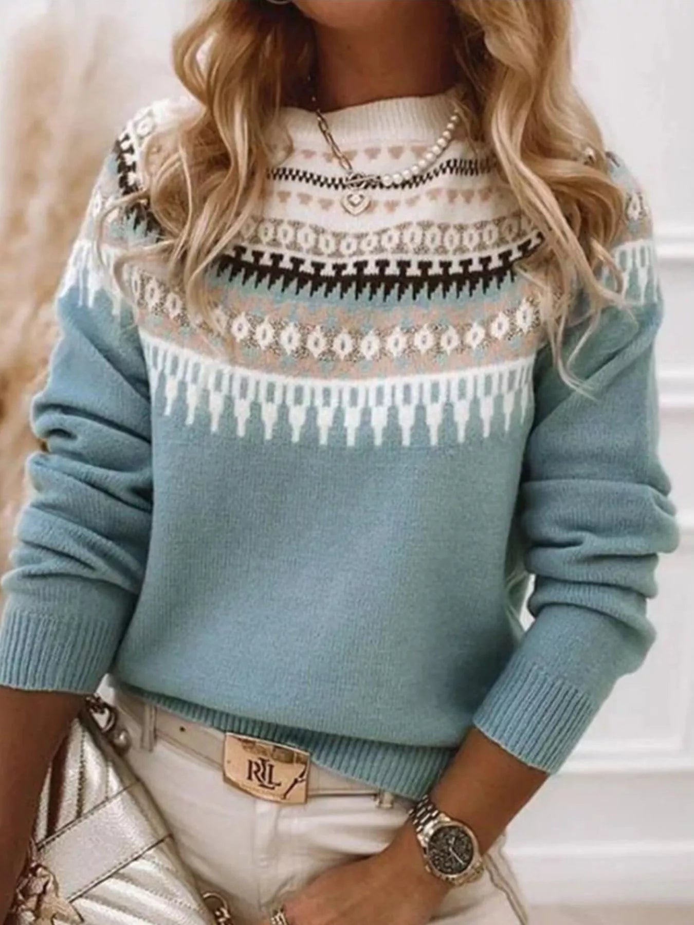 Woman wearing a vintage patterned round neck sweater
