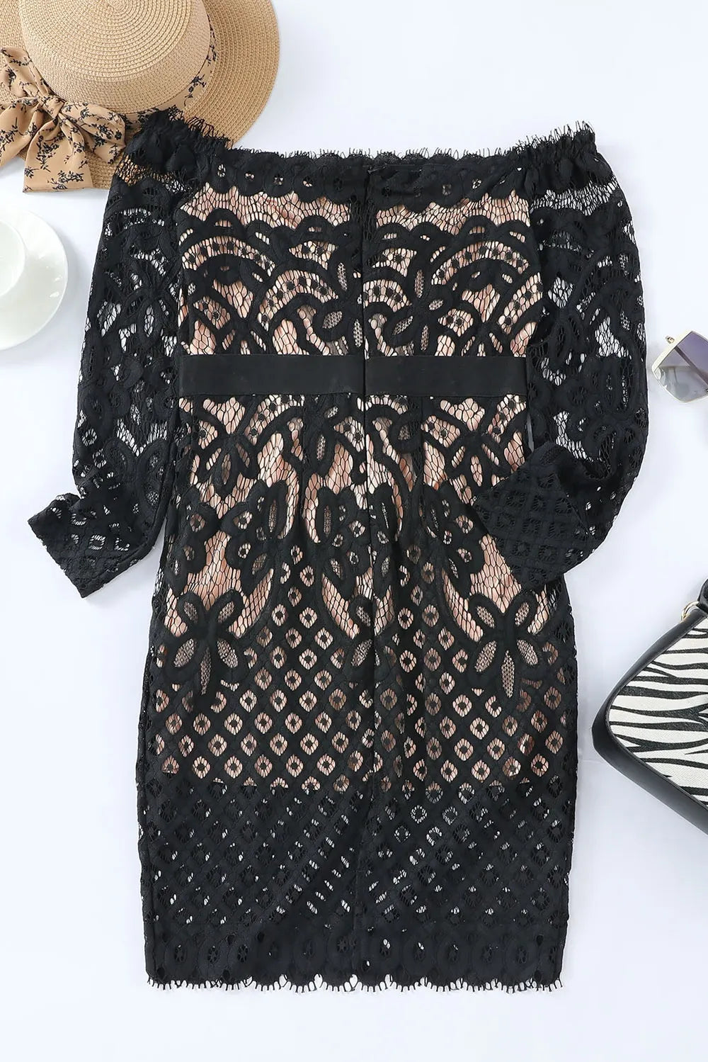 Picture of the back of a zip up lace bodycon dress