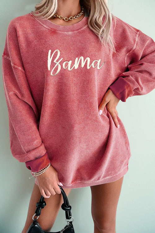 woman wearing corded alabama embroidered sweatshirt