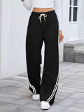 woman wearing drawstring side stripe lounge pants