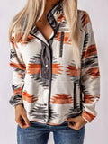 woman wearing a fleece snap down western print jacket