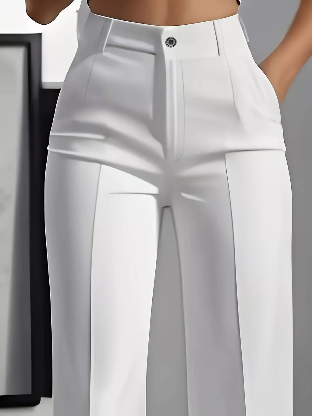 woman wearing high waisted wide leg pants