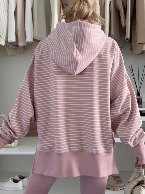woman wearing a hooded pink stripe  hoodie
