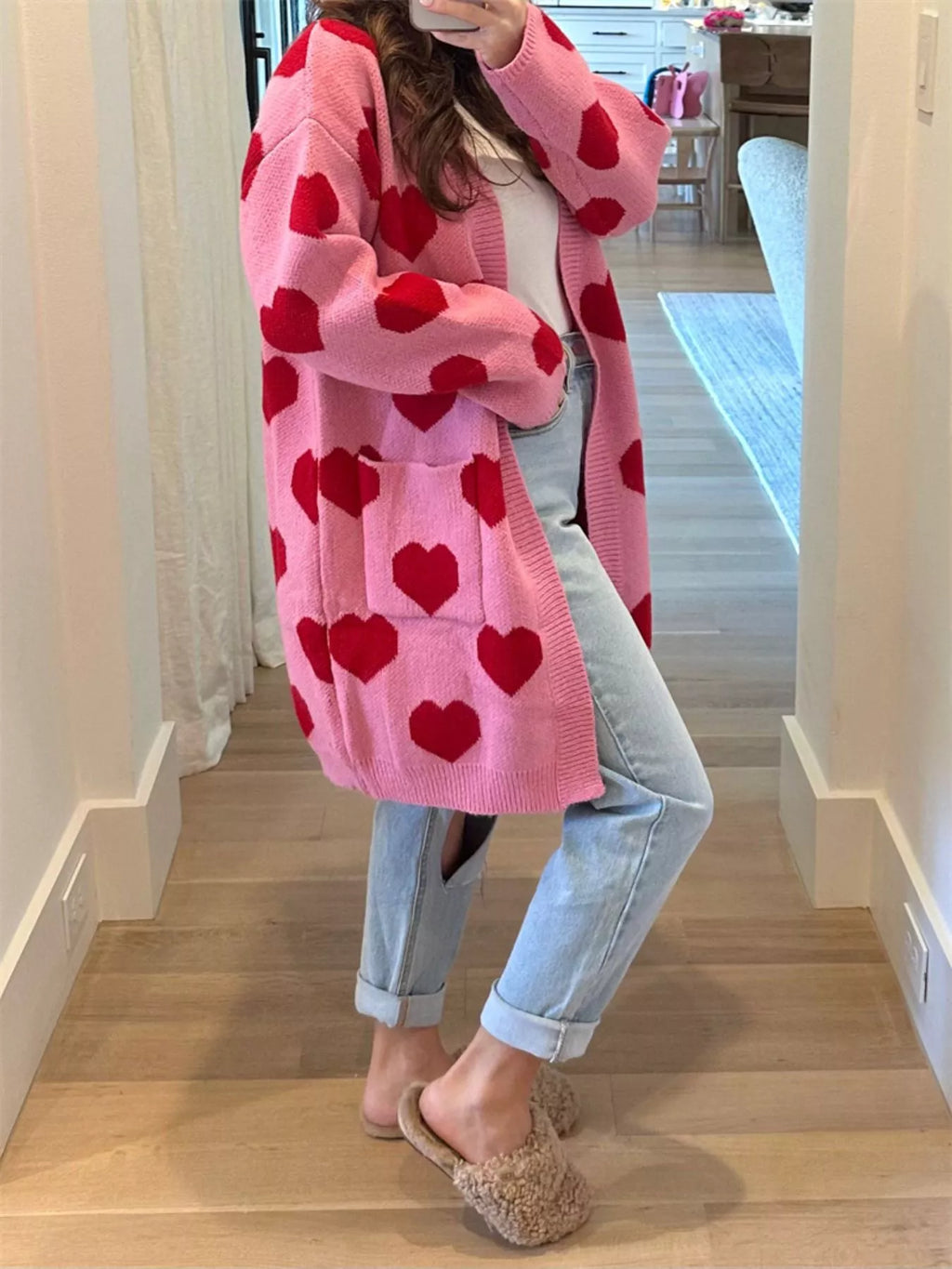 woman wearing a longline cardigan with pockets