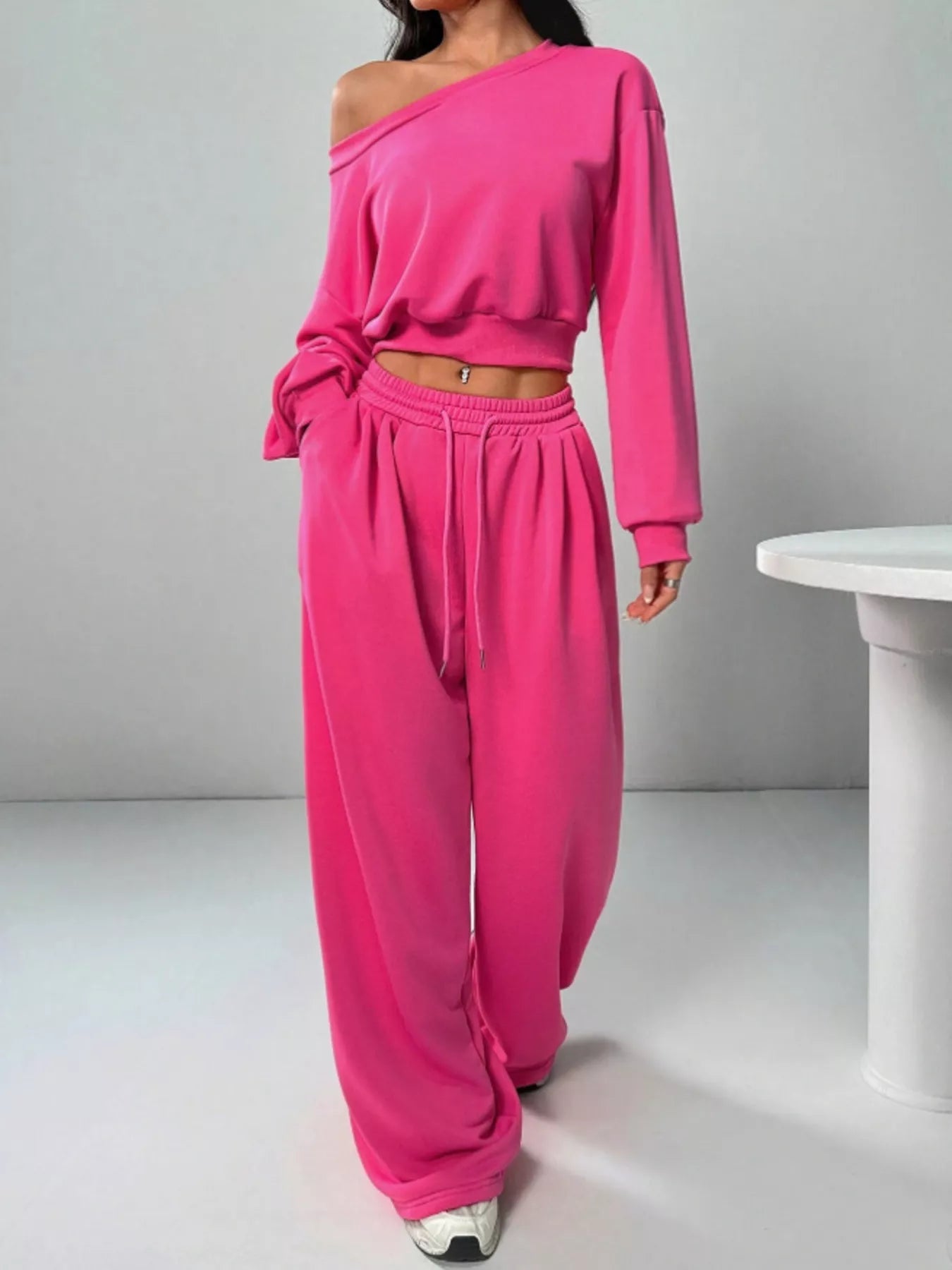 woman wearing a pink two piece lounge set