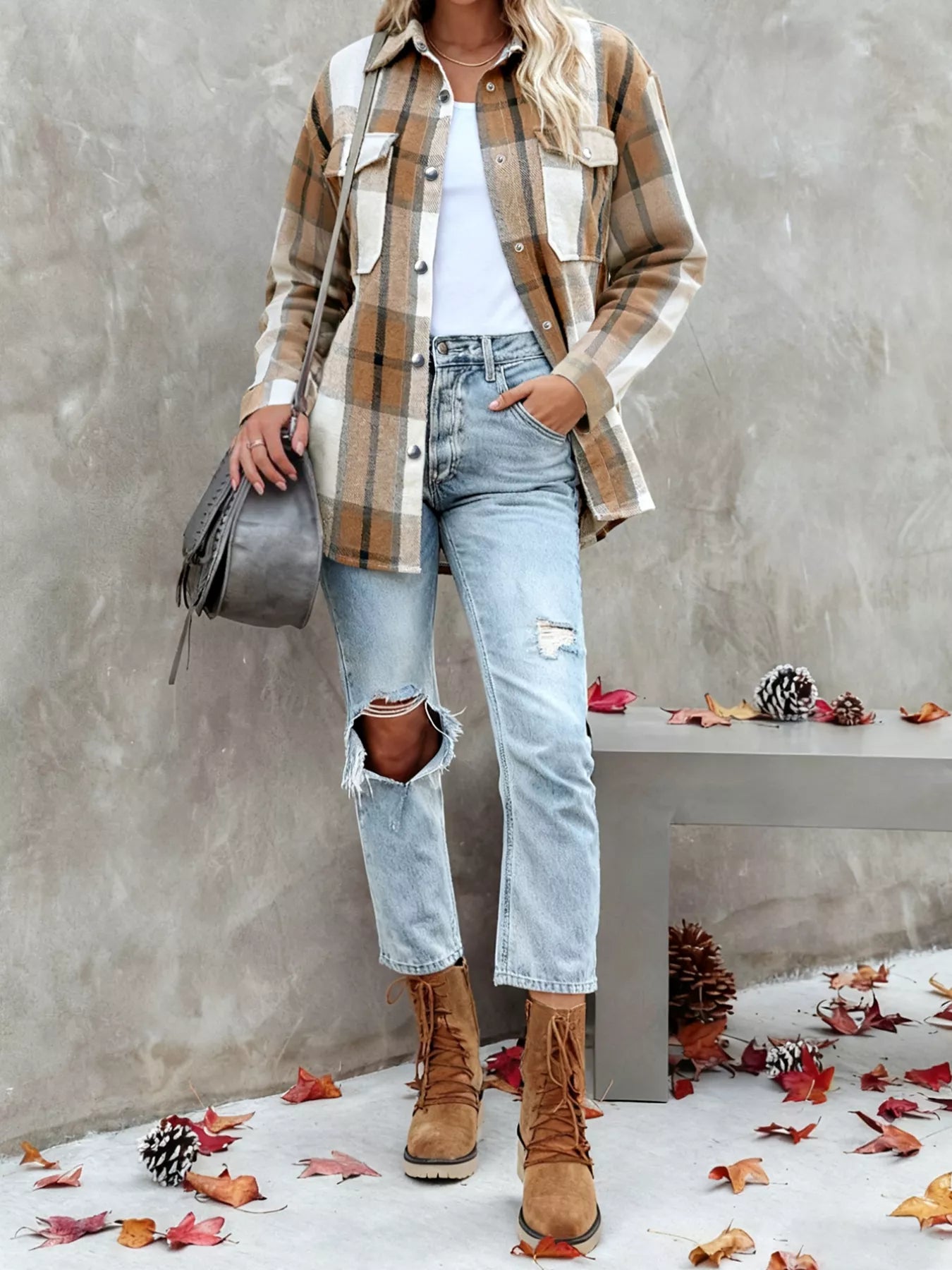 woman wearing a plaid button up top