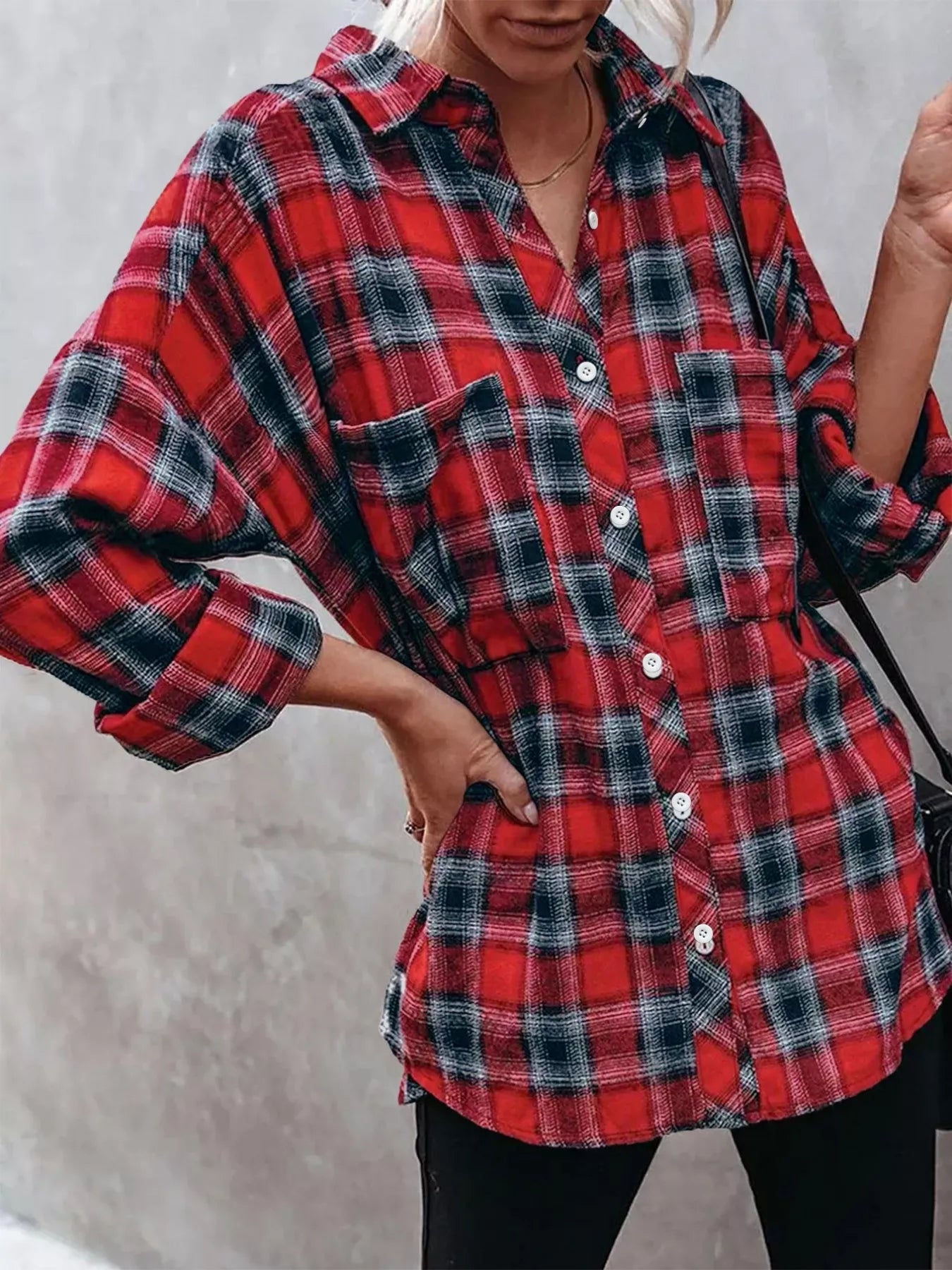 woman wearing a plaid long sleeve button up