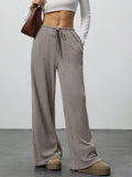 woman wearing relaxed fit drawstring lounge pants