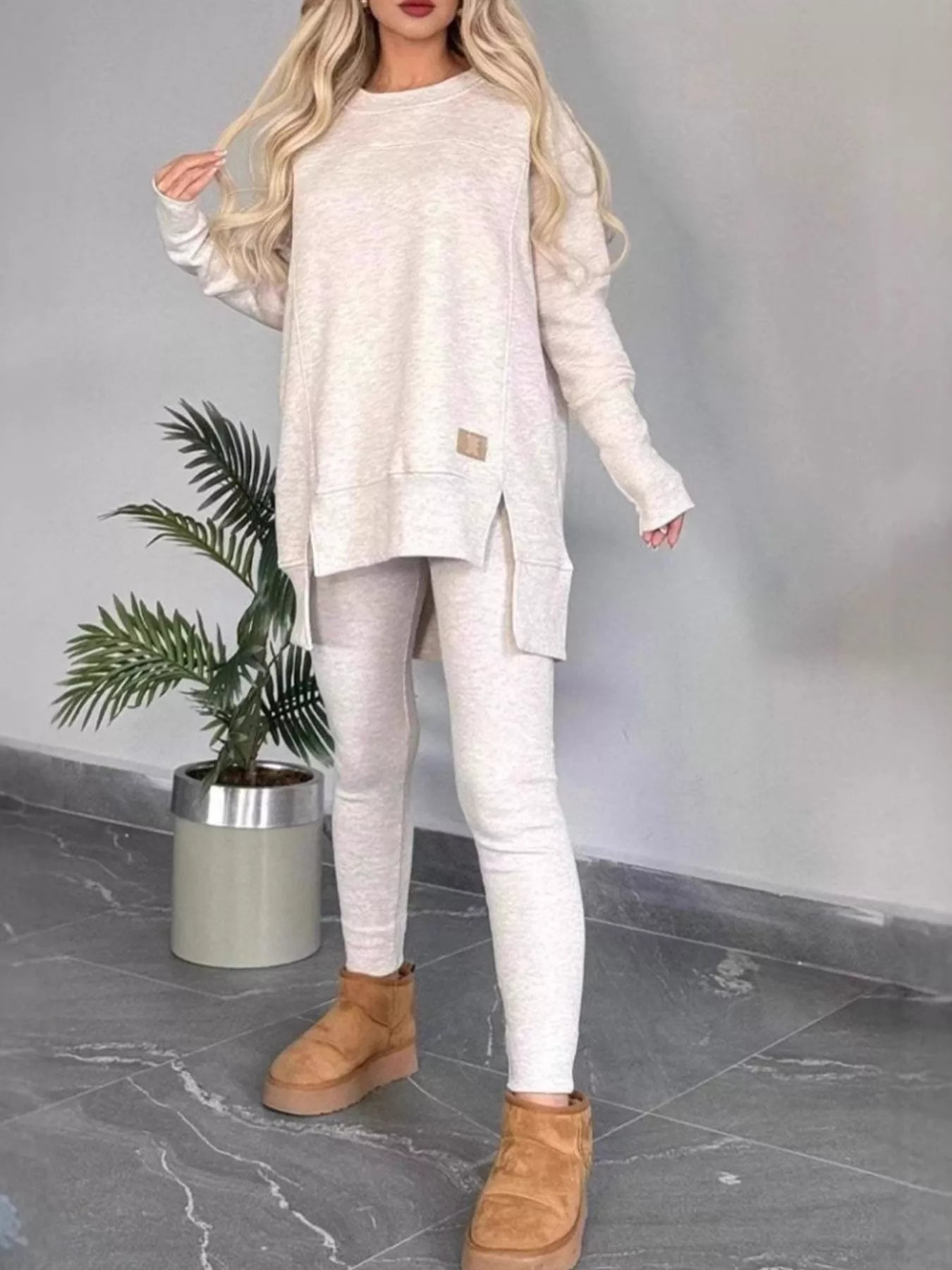 woman wearing a soft slit lounge set