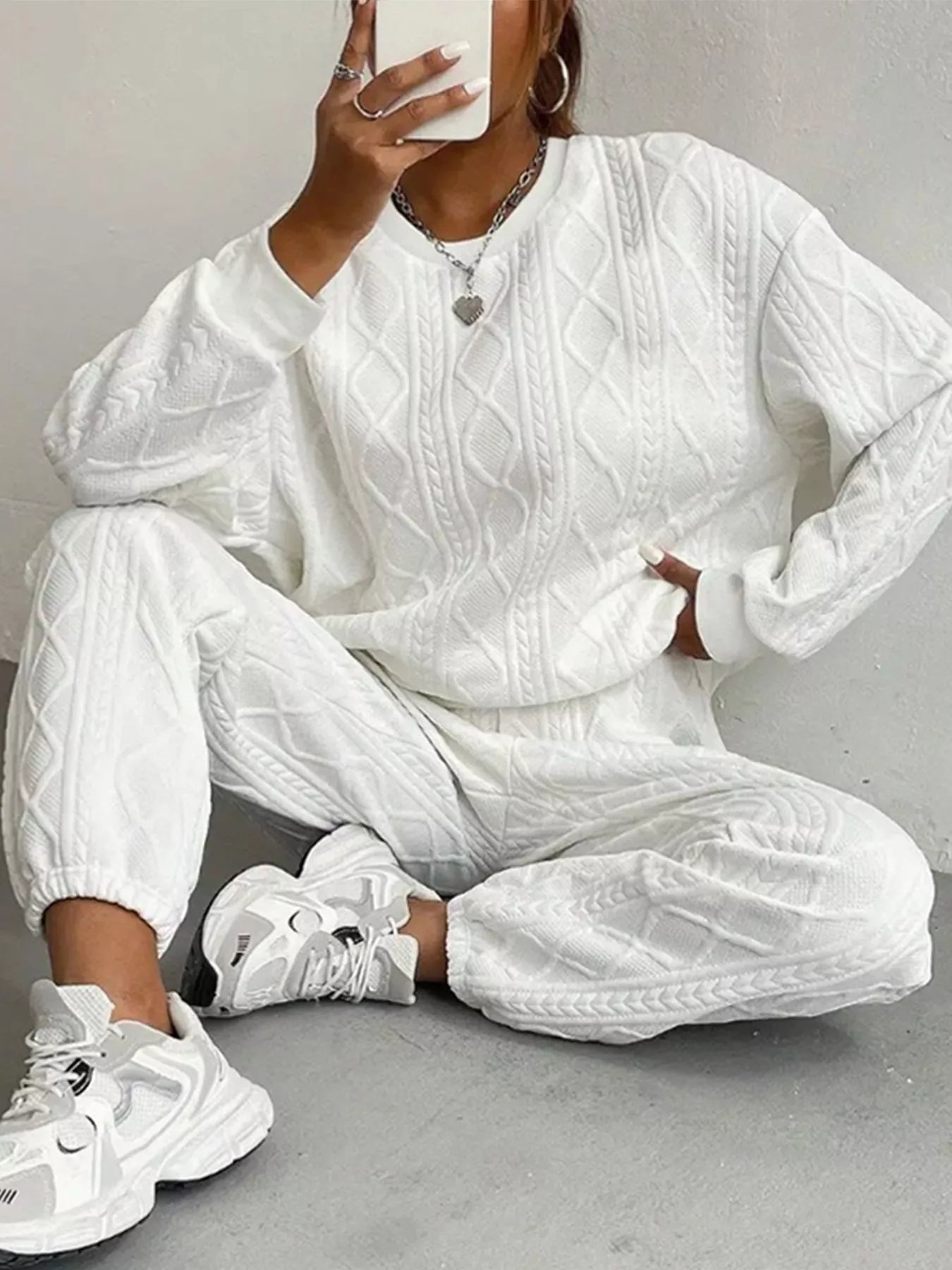 woman wearing a white textured lounge set