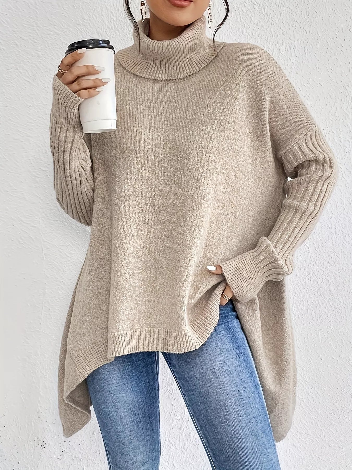 woman wearing a turtleneck high low hem knit sweater